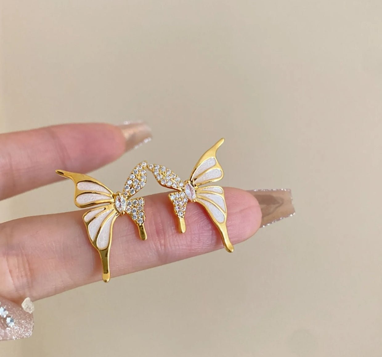 Elegant gold colour butterfly stud - Nishkarsh the royal radiance