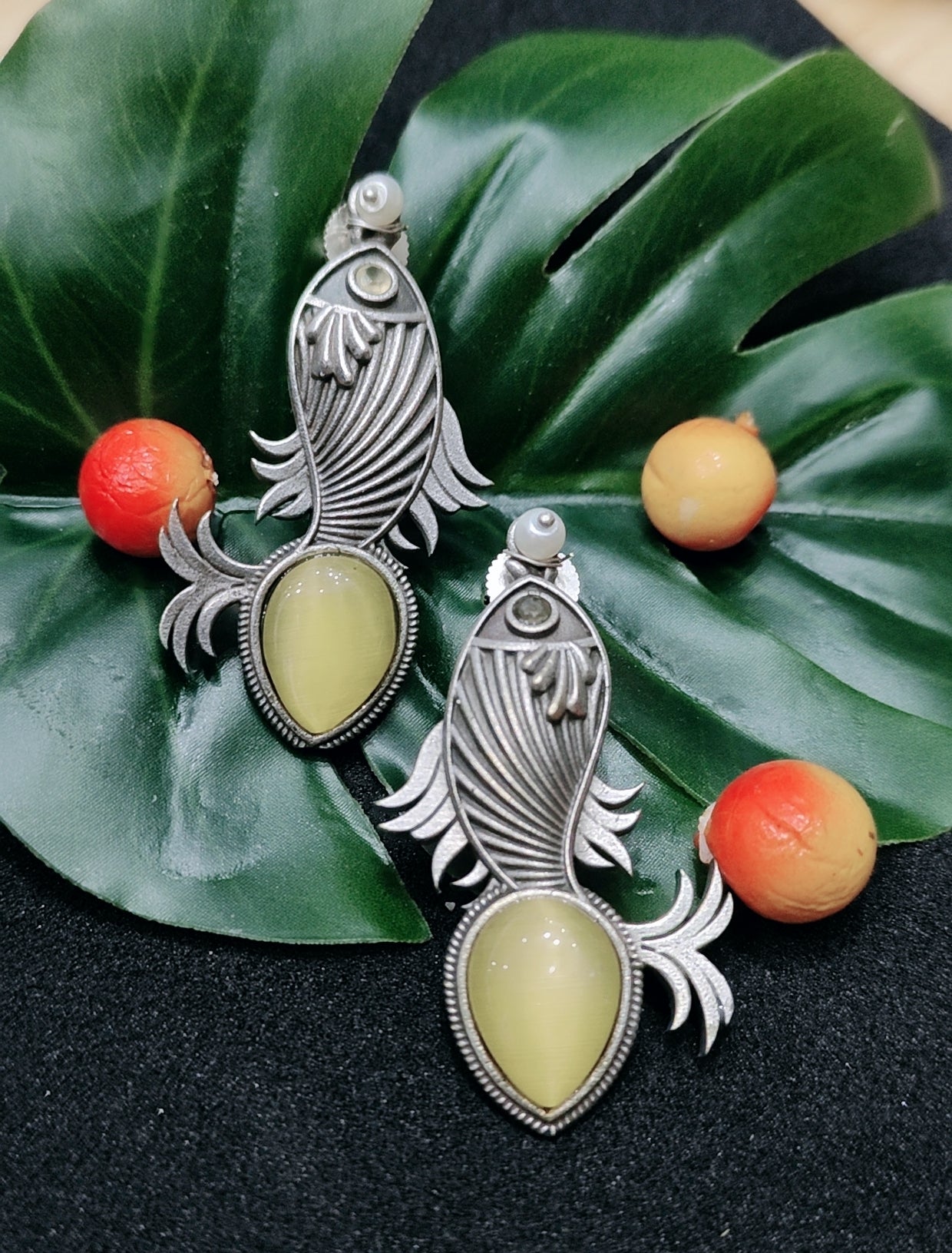 Oxidised silver fish theme monalisa stone earrings - Nishkarsh the royal radiance