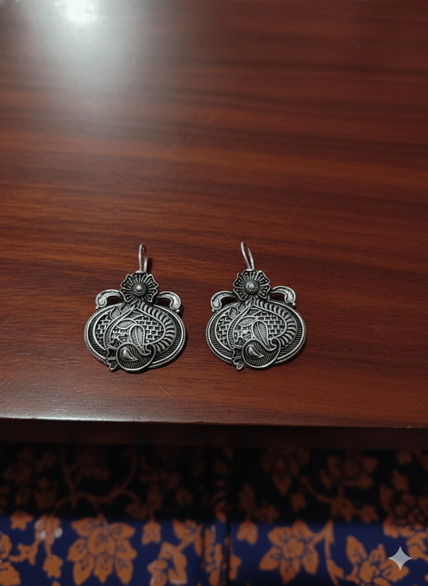 Oxidised Silver Floral And Paisley Detail Drop Earrings for Women - Nishkarsh the royal radiance