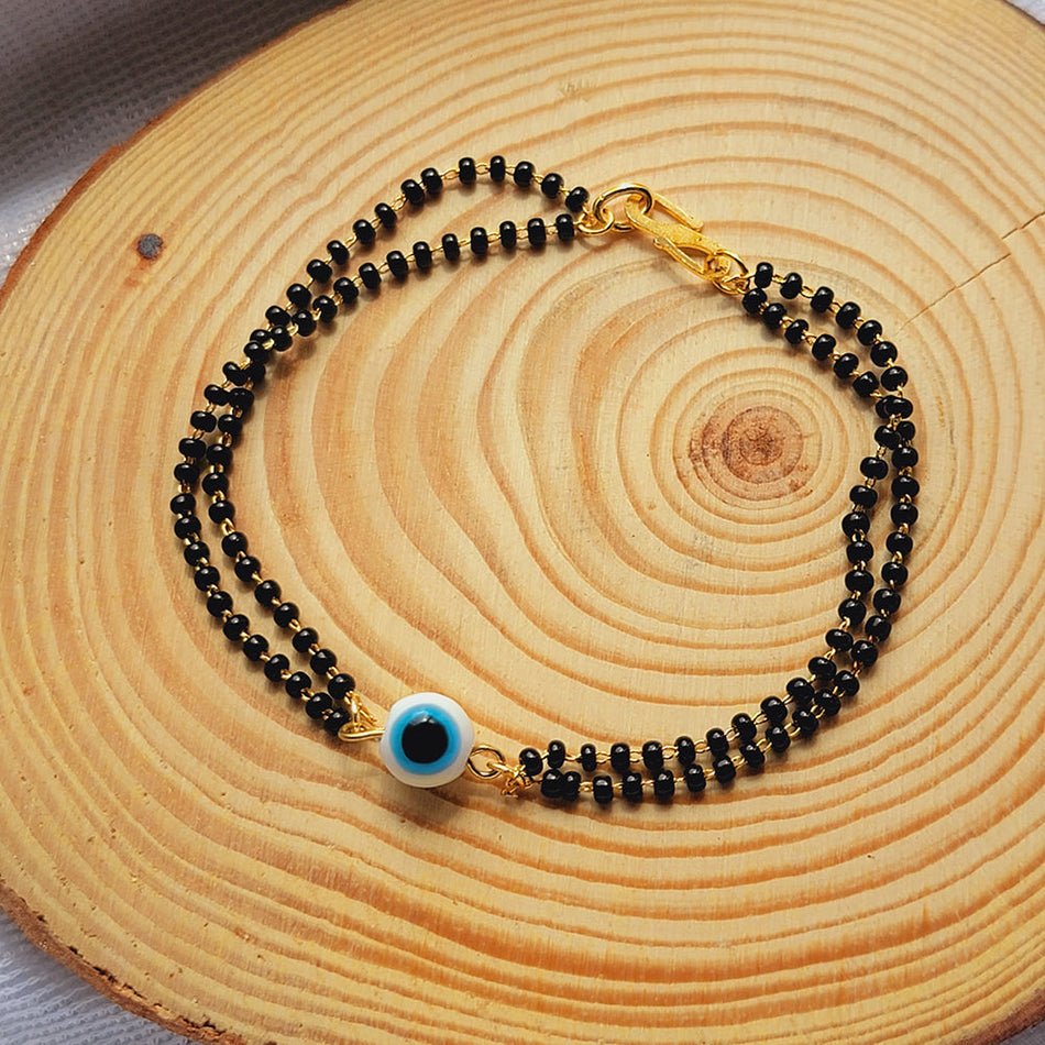 Evil eye dual chain mangalsutra bracelet with black beads for women - Nishkarsh the royal radiance