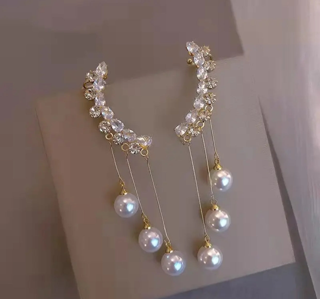 Zircon & pearl ear cuffs with chain - Nishkarsh the royal radiance