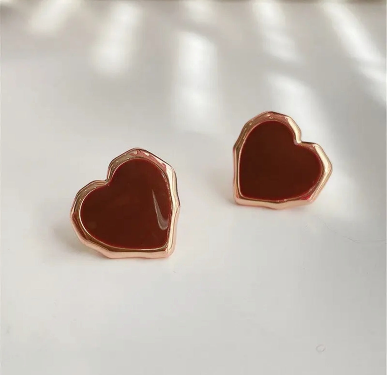 Red heart shape stud earrings - Nishkarsh the royal radiance