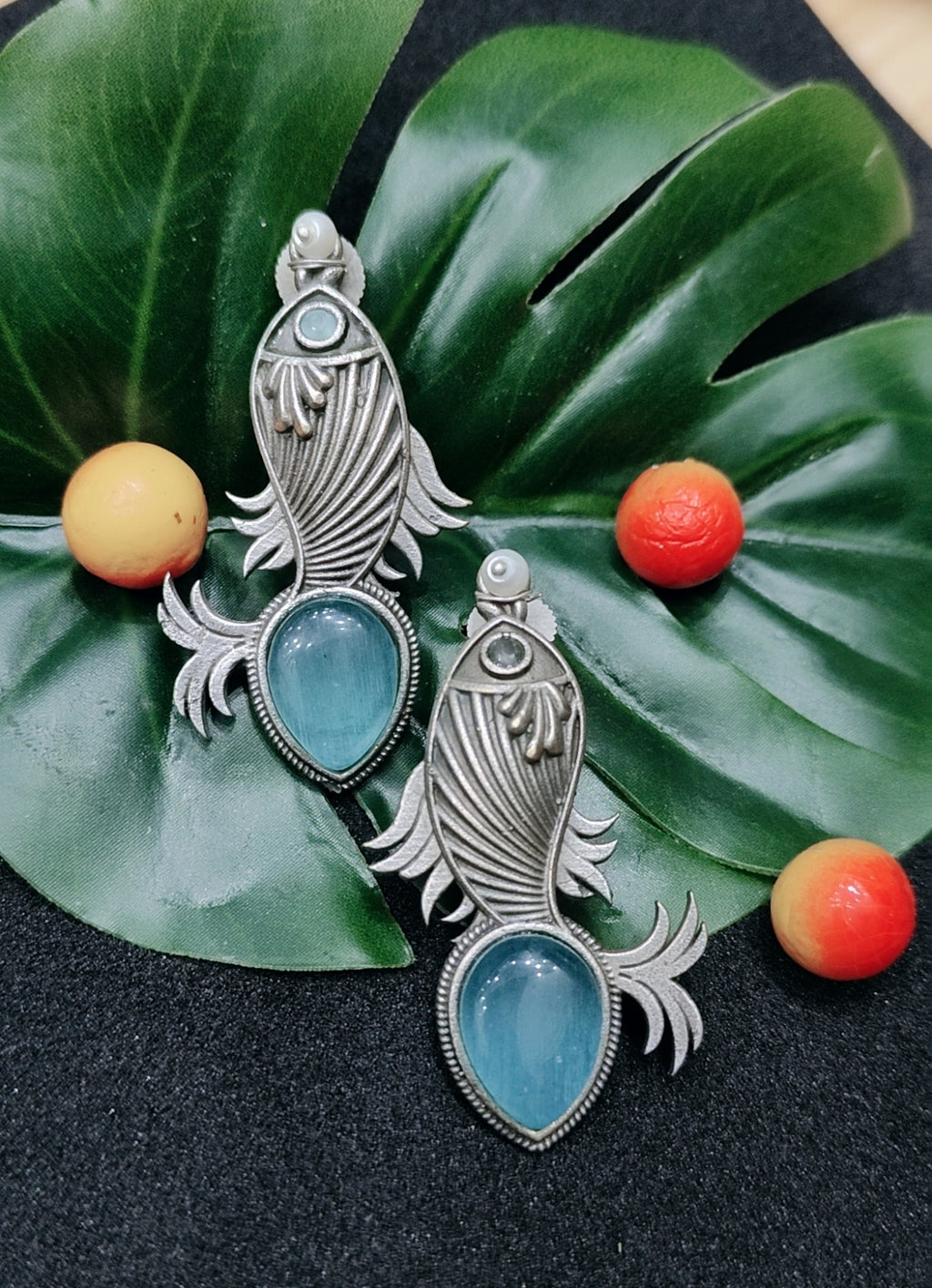 Oxidised silver fish theme monalisa stone earrings - Nishkarsh the royal radiance