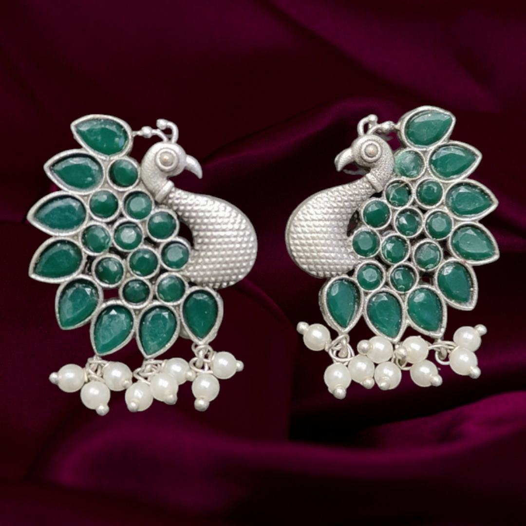 Oxidised silver peacock theme monalisa stone earrings - Nishkarsh the royal radiance