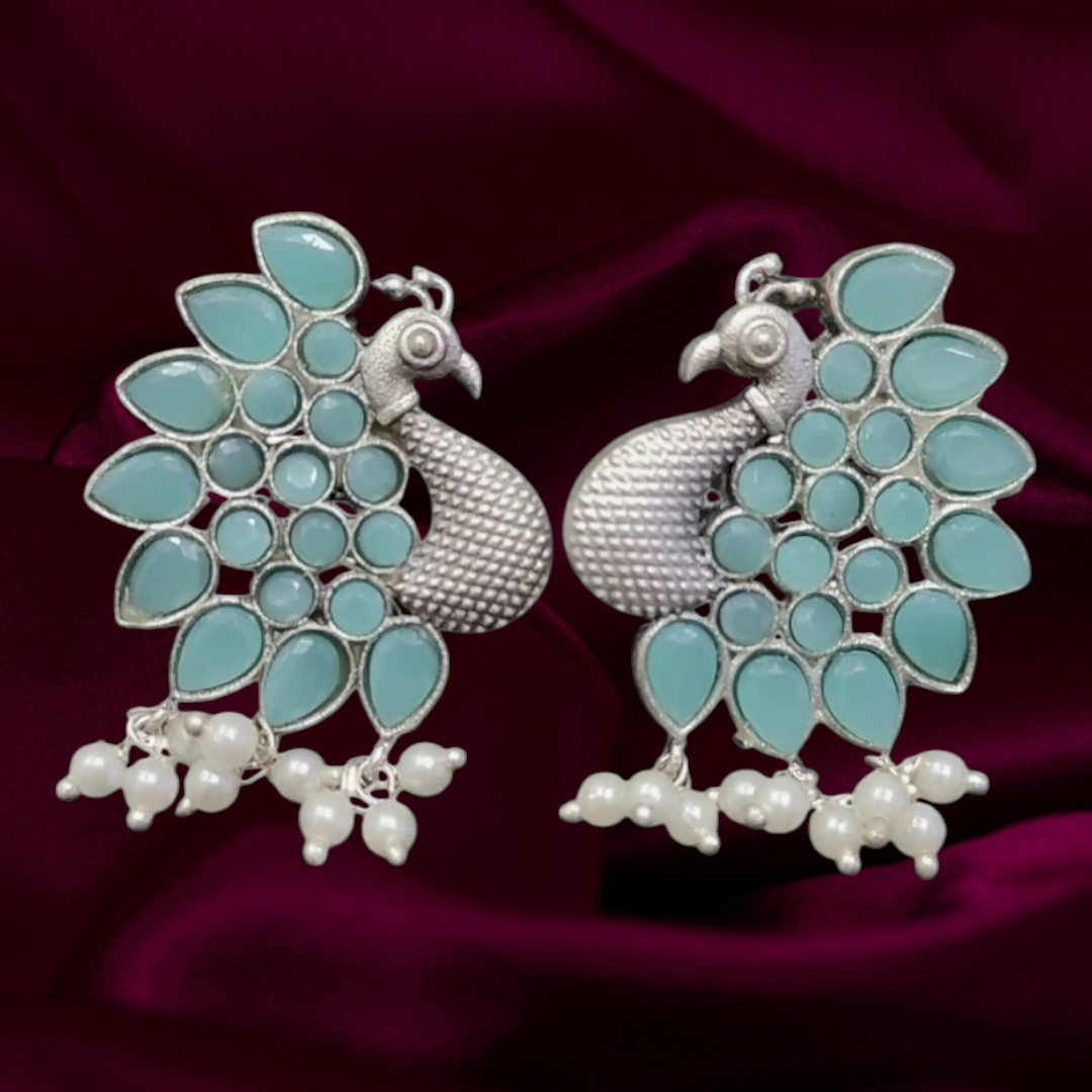 Oxidised silver peacock theme monalisa stone earrings - Nishkarsh the royal radiance